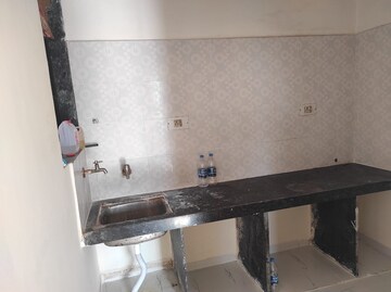 Kitchen in 1 BHK Apartment at Omkar Puram CHS, Adai – for Sale