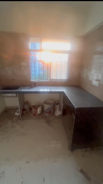 Kitchen in 1 BHK Apartment at Ashoka Nahur Gaonthan Shivshakti CHS, Mulund West – for Sale