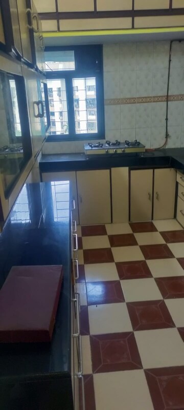 Kitchen in 2 BHK Apartment at Vasant Mandar CHS, Vasant Vihar – for Rent