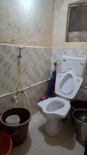 Bathroom in 1 BHK Apartment at Kopar Khairane Sector 19 – for Sale