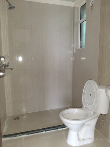 Bathroom in 2 BHK Apartment at Landcraft Golflinks Plaza, Pandav Nagar – for Rent