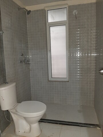 Bathroom in 2 BHK Apartment at Landcraft Golflinks Plaza, Pandav Nagar – for Rent