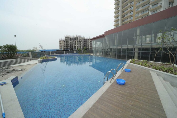 Swimming Pool, presithum-phase-ii 3 Bedroom 1440 Sq.Ft. Apartment In Sector 25 Yamuna Expressway Greater Noida 9080701