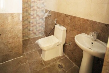 Bathroom in 3 BHK Apartment at Presithum Phase II, Sector 25 Yamuna Expressway – for Sale