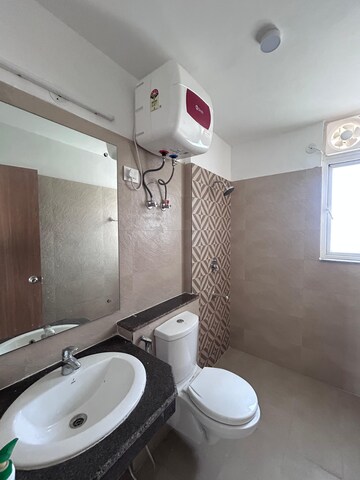 Bathroom in 3.5 BHK Apartment at ATS Homekraft Pious Hideaways, Sector 150 – for Rent