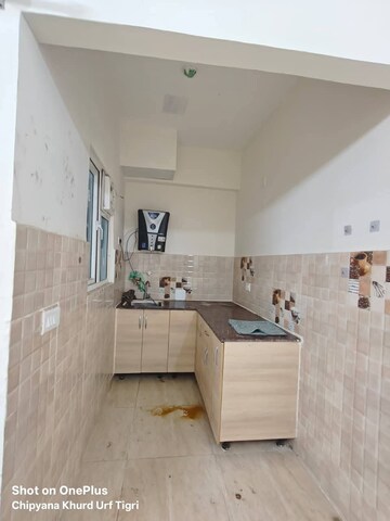 Kitchen in 1 BHK Apartment at Gaur City 2 - 14th Avenue, Sector 16c Greater Noida – for Rent