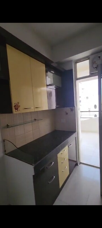Kitchen in 2 BHK Apartment at Amrapali Empire, Sain Vihar – for Sale