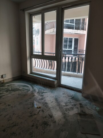 Living Room in 2 BHK Apartment at Sikka Karmic Greens, Sector 78 – for Rent