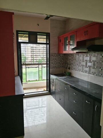 Kitchen in 1 BHK Apartment at Happy Home Sarvodaya Leela, Thakurli – for Rent
