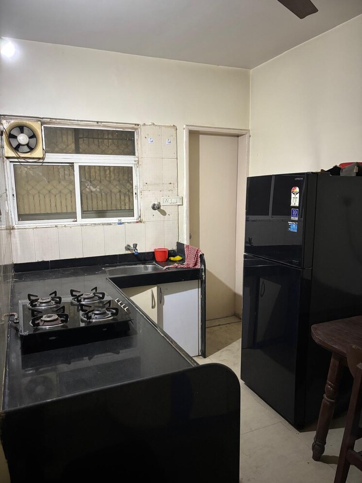 Kitchen, mahalaxmi-vihar 1 Bedroom 600 Sq.Ft. Apartment In Vishrantwadi Pune 9081070