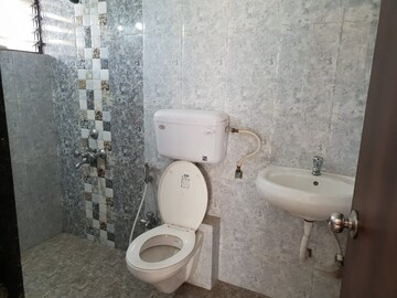 Bathroom in 2 BHK Apartment at Satyam Serenity, Wadgaon Sheri – for Sale