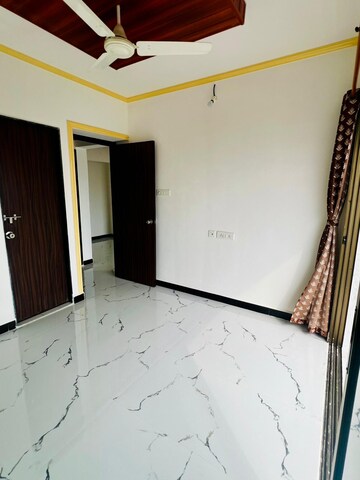 Master Bedroom in 1 BHK Apartment at Man Opus, Mira Road – for Sale