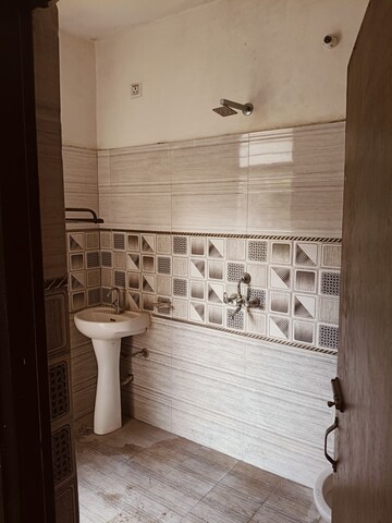 Bathroom in 2 BHK Builder Floor at Guru Nanak Enclave, Dhakoli – for Rent