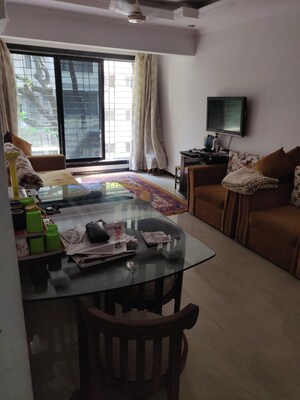 Living Room in 2 BHK Apartment at Parvati Nagar CHS, Andheri West – for Sale