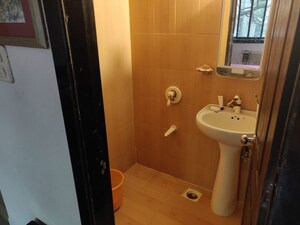 Bathroom in 2 BHK Apartment at Parvati Nagar CHS, Andheri West – for Sale