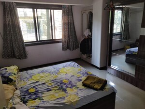 Bedroom in 2 BHK Apartment at Parvati Nagar CHS, Andheri West – for Sale