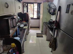 Kitchen in 2 BHK Apartment at Parvati Nagar CHS, Andheri West – for Sale