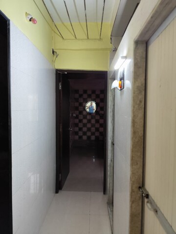 Building Lobby in 1 BHK Apartment at Deepanjali CHS, Malad West – for Rent