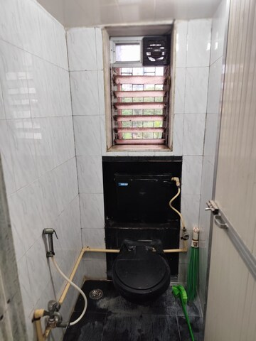 Bathroom in 1 BHK Apartment at Deepanjali CHS, Malad West – for Rent