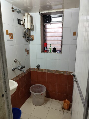 Bathroom in 1 BHK Apartment at Deepanjali CHS, Malad West – for Rent