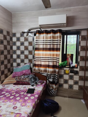 Living Room in 1 BHK Apartment at Deepanjali CHS, Malad West – for Rent