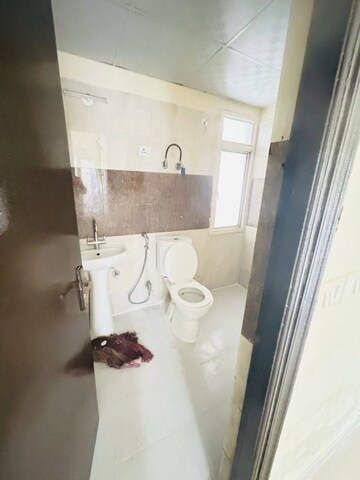 Bathroom in 3 BHK Apartment at Amrapali Golf Homes, Sector 4 Greater Noida – for Sale