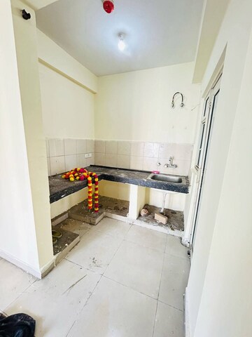 Kitchen in 3 BHK Apartment at Amrapali Golf Homes, Sector 4 Greater Noida – for Sale