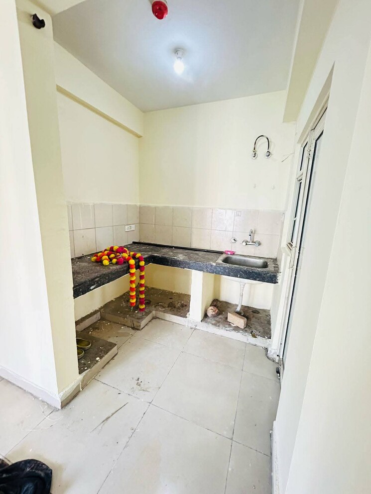 Kitchen, amrapali-golf-homes 3 Bedroom 1115 Sq.Ft. Apartment In Sector 4 Greater Noida Greater Noida 9081763