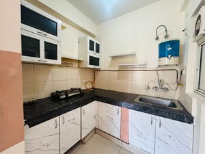 Kitchen in 3 BHK Apartment at Amrapali Golf Homes, Sector 4 Greater Noida – for Sale