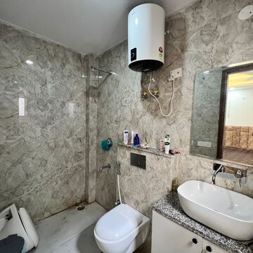 Bathroom in 3 BHK Builder Floor at Freedom Fighters Enclave – for Rent