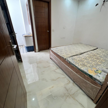 Bedroom in 3 BHK Builder Floor at Freedom Fighters Enclave – for Rent