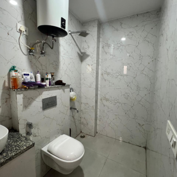 Bathroom in 3 BHK Builder Floor at Freedom Fighters Enclave – for Rent