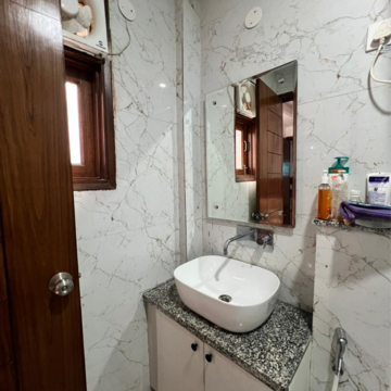 Bathroom in 3 BHK Builder Floor at Freedom Fighters Enclave – for Rent