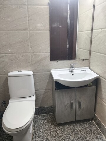 Bathroom in 2 BHK Apartment at Boutique Residential Apartments C-220, Malviya Nagar – for Rent