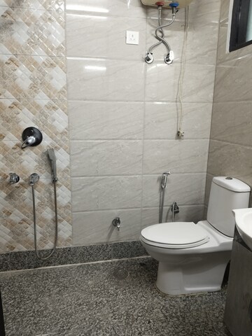 Bathroom in 2 BHK Apartment at Boutique Residential Apartments C-220, Malviya Nagar – for Rent