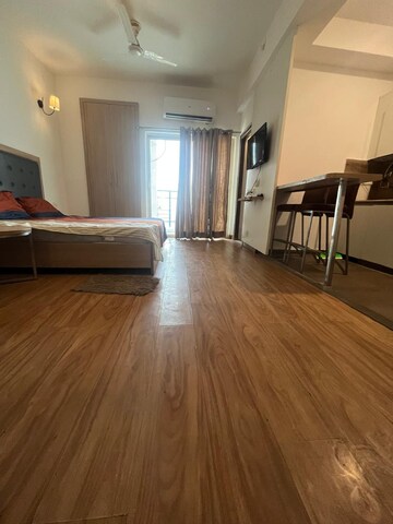 Bedroom in Studio Apartment at Nimbus The Golden Palm, Sector 168 – for Rent
