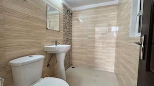 Bathroom in 3 BHK Apartment at Rajhans Premier Towers, Indrapuram – for Sale