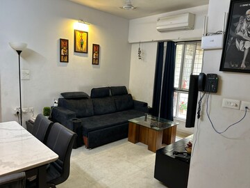 Living Room in 1 BHK Apartment at Lodha Amara, Kolshet Road – for Sale