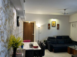 Living Room in 1 BHK Apartment at Lodha Amara, Kolshet Road – for Sale