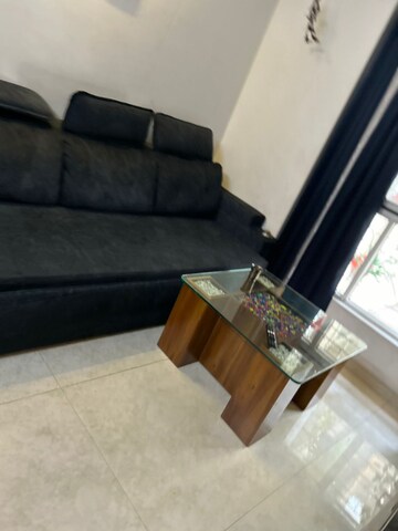 Living Room in 1 BHK Apartment at Lodha Amara, Kolshet Road – for Sale