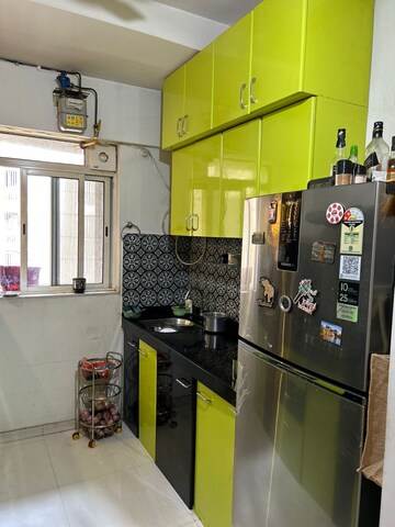 Kitchen in 1 BHK Apartment at Lodha Amara, Kolshet Road – for Sale