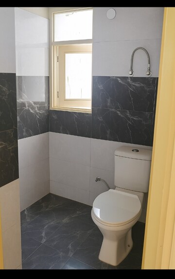 Bathroom in 2 BHK Apartment at SVP Gulmohur Garden, Raj Nagar Extension – for Sale