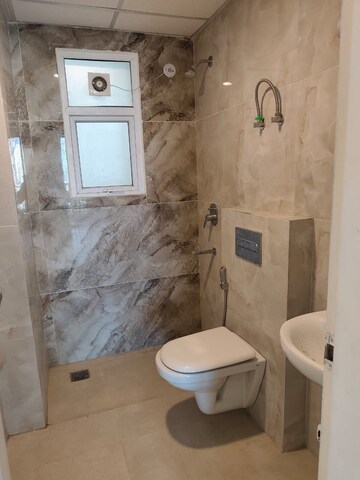 Bathroom in 3 BHK Apartment at Omaxe The Palace, Gomti Nagar – for Rent
