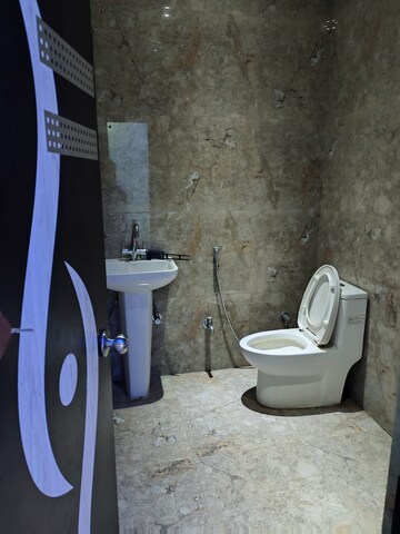 Bathroom in 3 BHK Apartment at Omaxe The Palace, Gomti Nagar – for Rent