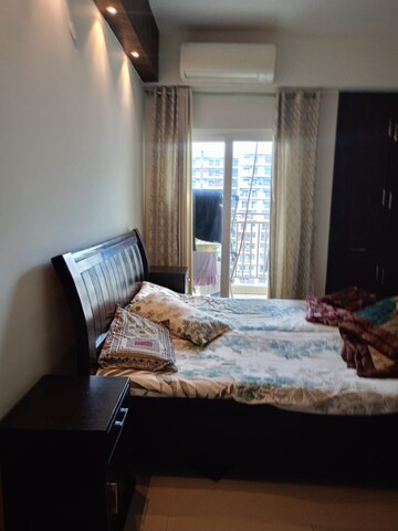 Bedroom in 3 BHK Apartment at Mahagun Moderne, Sector 78 – for Rent