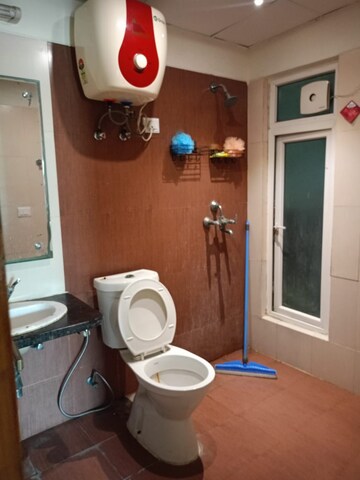 Bathroom in 3 BHK Apartment at Mahagun Moderne, Sector 78 – for Rent