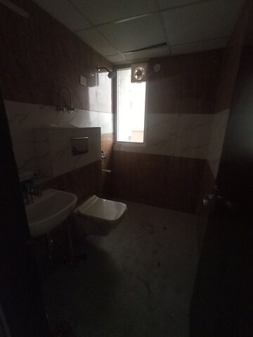 Bathroom in 3 BHK Apartment at Unnati Fortune The Aranya, Sector 119 – for Rent