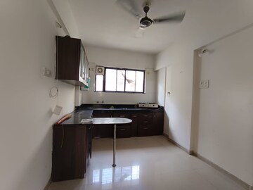 Kitchen in 2 BHK Apartment at Shree Manibhadra Swapna Sankul, Rahatani – for Rent