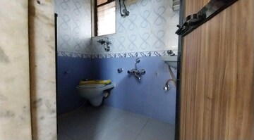 Bathroom in 1 BHK Apartment at Sonal Link Residency, Malad West – for Rent