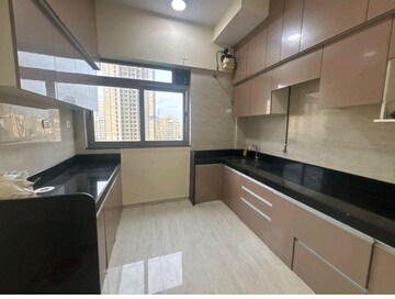 Kitchen in 2 BHK Apartment at Sheth Auris Serenity Tower 1, Malad West – for Rent